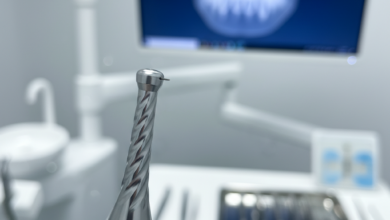 Close-up of gleaming, high-tech dental implant surgical instruments in a sterile, modern dental clinic, with a blurred background suggesting advanced digital planning and comfort.
