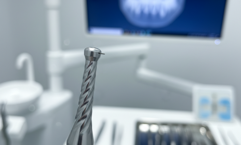 Close-up of gleaming, high-tech dental implant surgical instruments in a sterile, modern dental clinic, with a blurred background suggesting advanced digital planning and comfort.