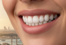 Close-up of a person with a radiant, healthy smile and bright, perfectly aligned teeth, with a blurred backdrop of the modern Istanbul cityscape at sunset, conveying successful dental treatment and medical tourism in Turkey.