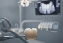 A photorealistic close-up of a meticulously crafted, natural-looking dental crown with translucent qualities, set against a softly blurred background of a clean, modern dental clinic interior.