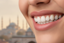 A photorealistic, close-up image of a perfect, bright, and healthy human smile with pristine, natural-looking teeth, set against a very softly blurred background showing indistinct elements of Turkish architecture or a distant cityscape.