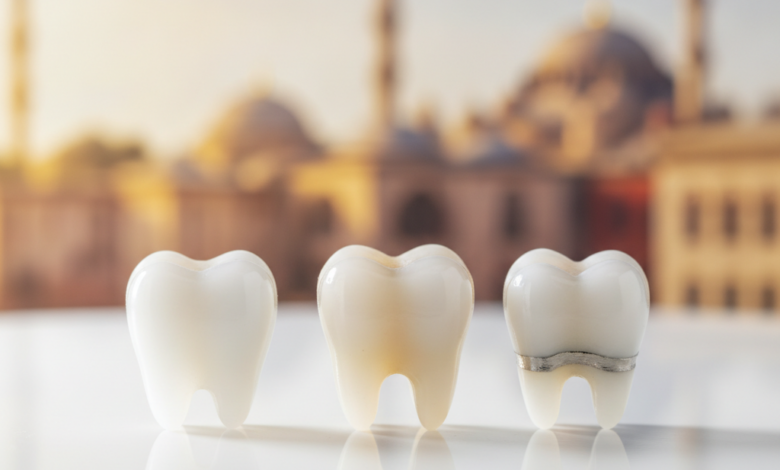Close-up of multiple gleaming dental crowns (porcelain, zirconia, and porcelain-fused-to-metal) on a clean white surface, with a blurred background subtly featuring warm-toned Turkish architectural elements.