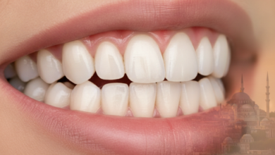 A close-up view of a perfect, bright smile with natural-looking teeth, implying successful dental crown work, set against a softly blurred background of Istanbul, Turkey's cityscape with historical buildings and waterways.